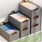 Several 45 cm foldable storage boxes stacked, showcasing uniform design for systematic decluttering.