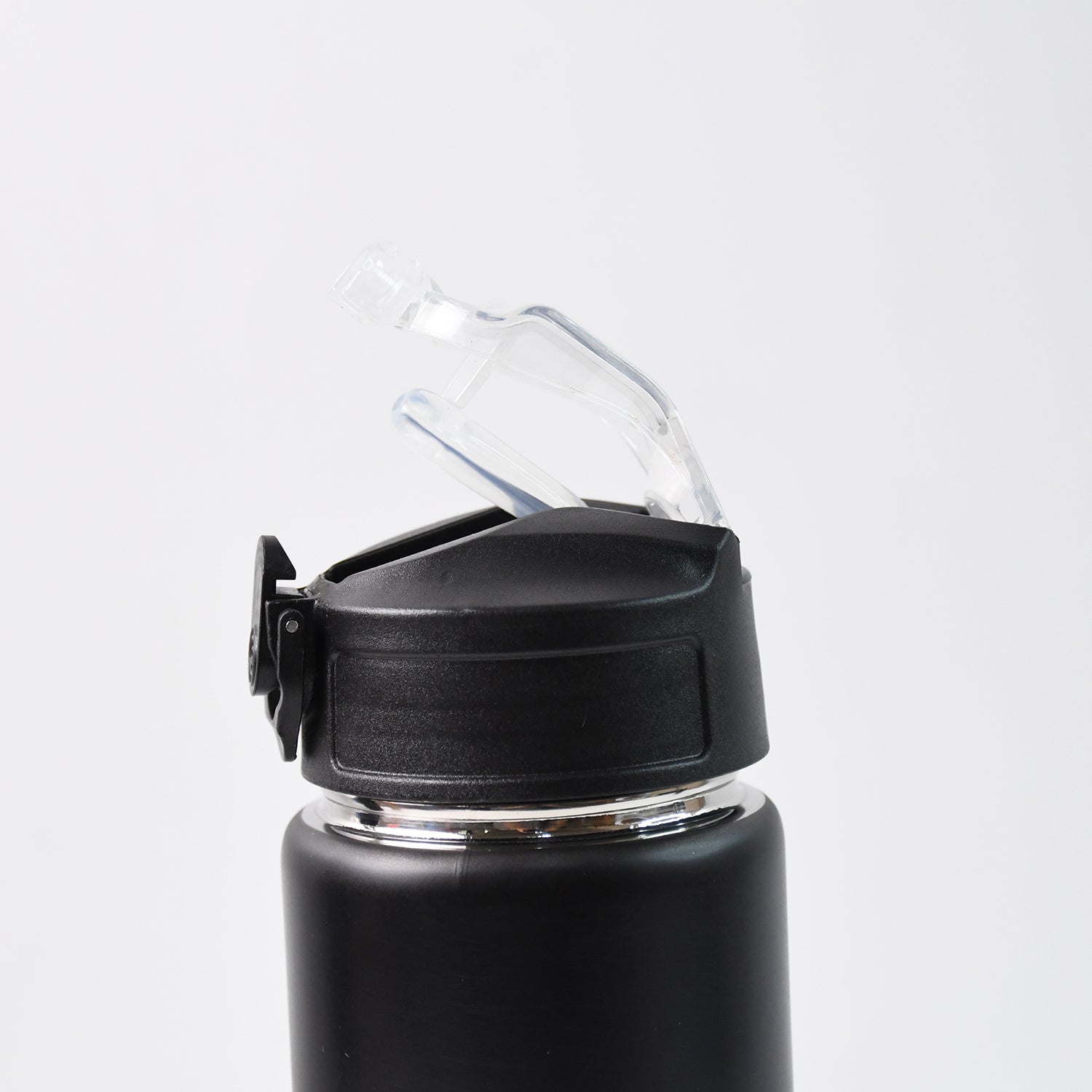 Flip-top lid with silicone straw on stainless steel sports water bottle