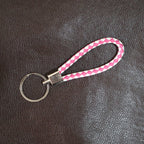 Stylish braided leather style keychain accessory with durable metal ring