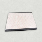 Button clip box file on an office desk, ready for use.