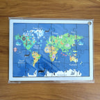 Interactive wooden world map puzzle for kids, promoting hands-on learning.