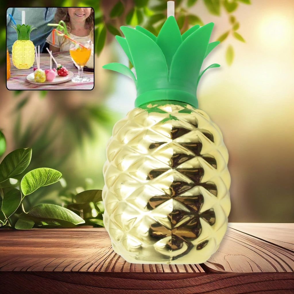 Pineapple cup with straw filled with a refreshing tropical beverage.