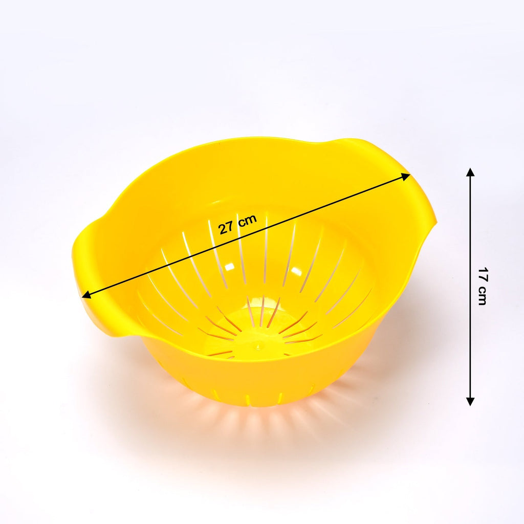 The versatile fruit and vegetable washing bowl placed on a kitchen counter.