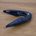 Durable handheld nut and seafood shell cracker tool