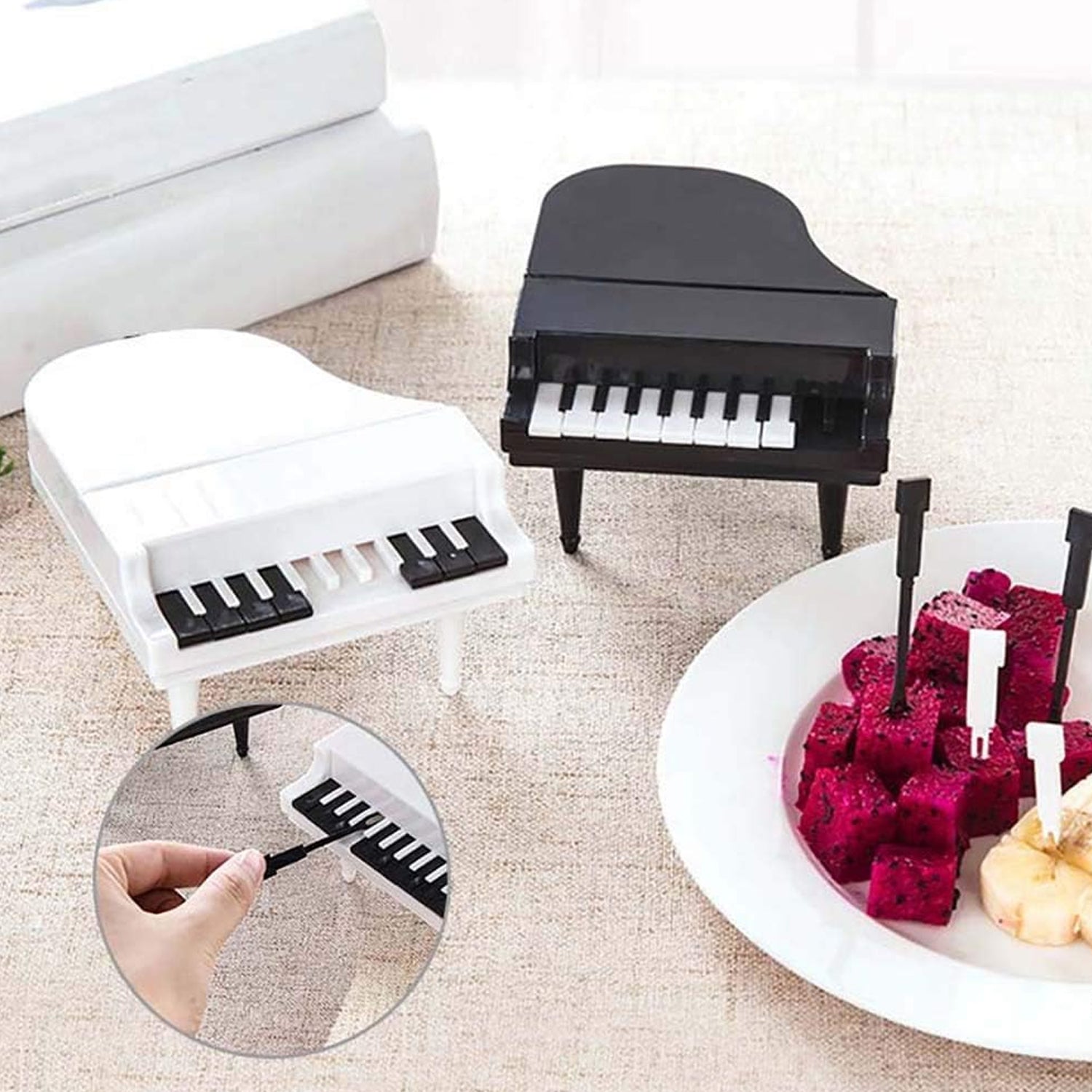 The 10-piece piano fruit forks set showcased in its packaging, ideal for gifting unique kitchen tools.