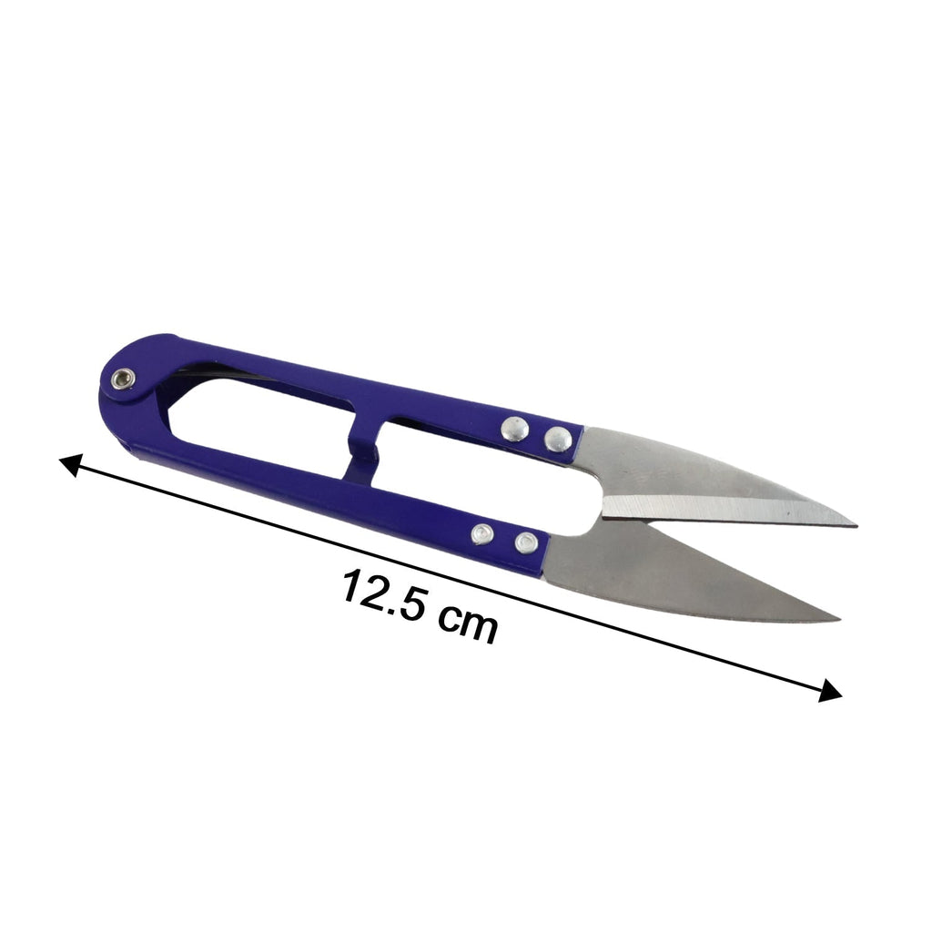 Detail of precision cutting edge on ergonomic sewing scissors