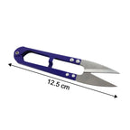 Detail of precision cutting edge on ergonomic sewing scissors