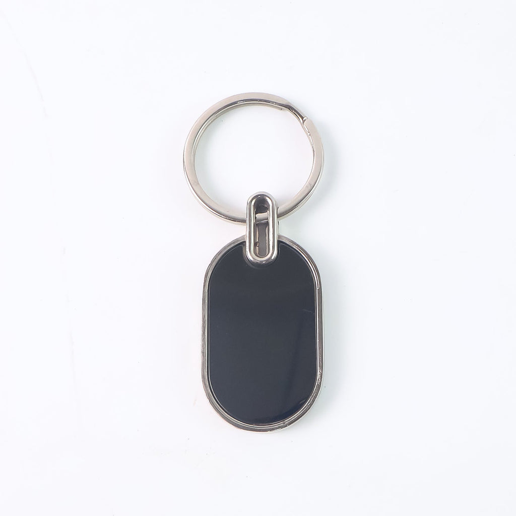 Monogram edge silver and black oval metal key holder accessory