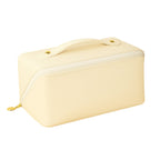 Beige toiletry and makeup pouch with zipper ideal for travel storage