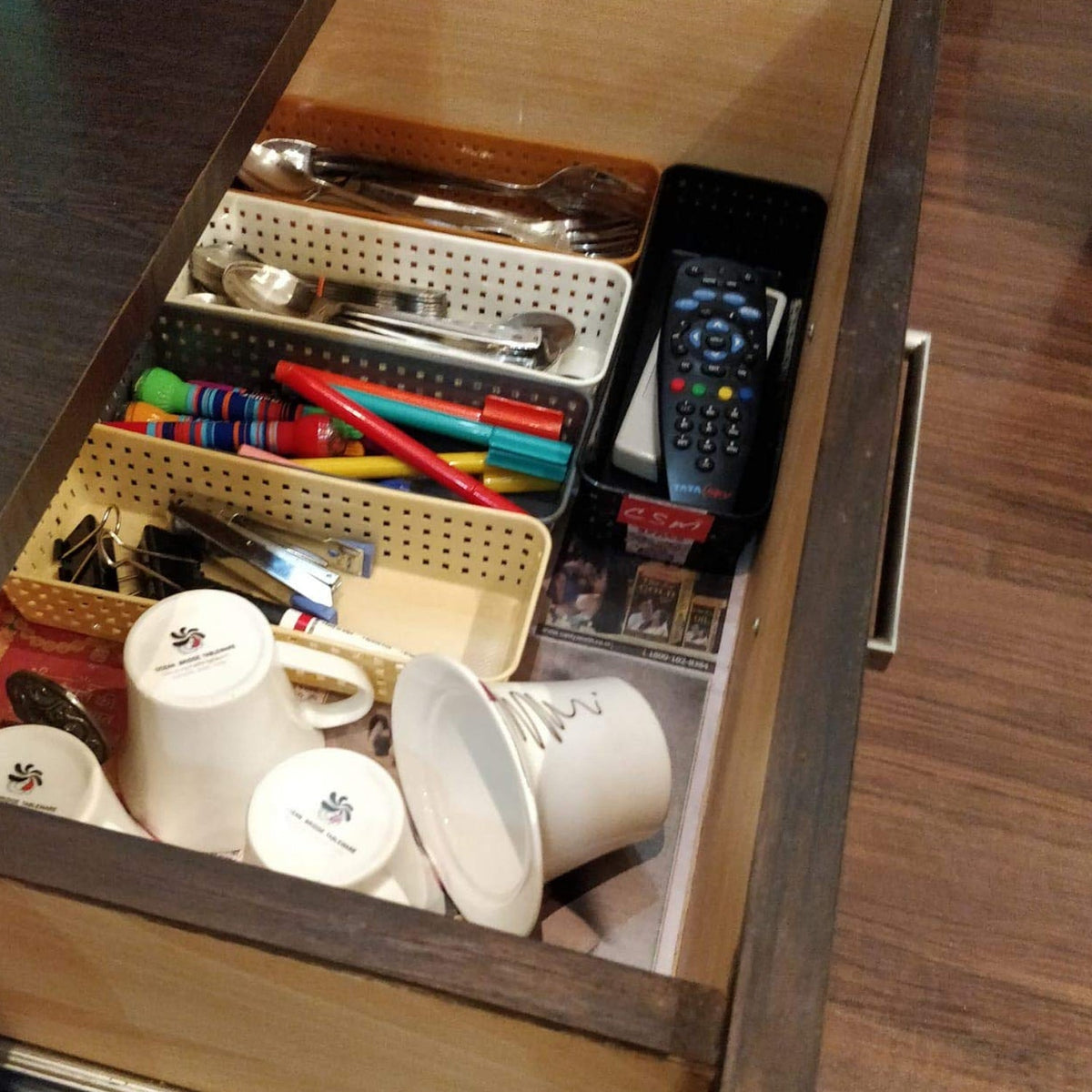 Set of six plastic desk organizer trays displayed on a clean white surface.