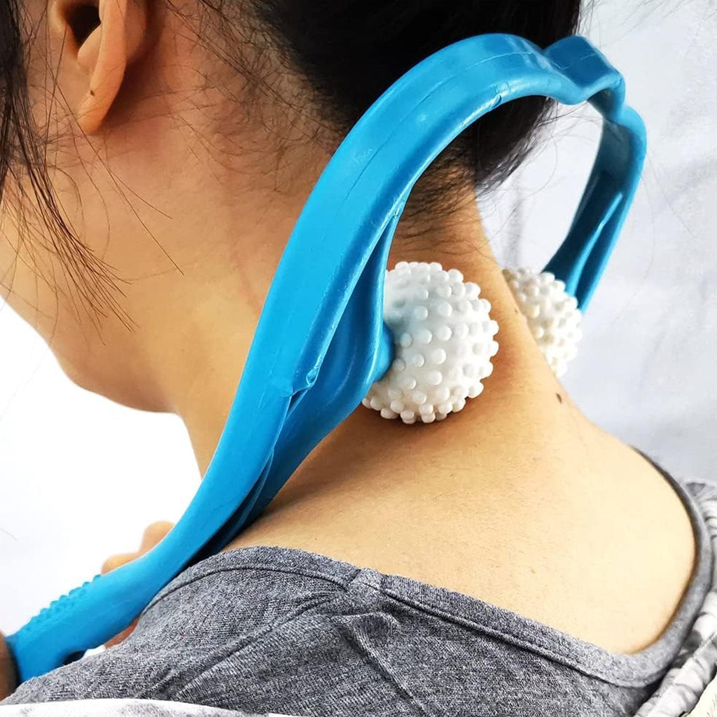 Woman experiencing deep relaxation with the neck and shoulder massager at home.