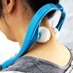 Woman experiencing deep relaxation with the neck and shoulder massager at home.