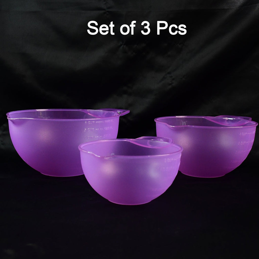 Pouring ingredients easily from mix and measure prep bowl with handle