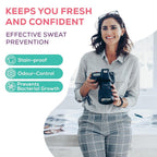 Model confidently raising arm, showcasing discreet anti-perspiration pad use.