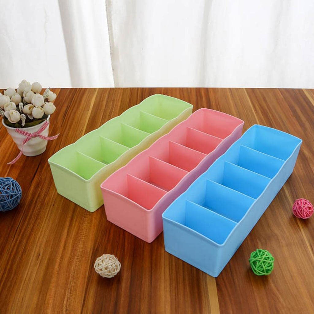 Innovative compartmentalized storage boxes providing efficient wardrobe organization for small items.