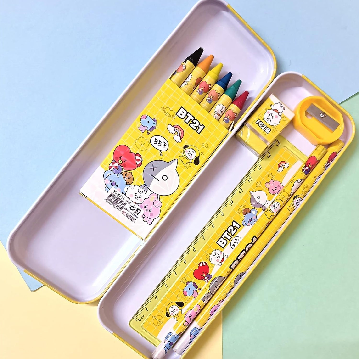 Engaging 12-piece kids stationery school kit with cartoon metal pencil box and erasers.