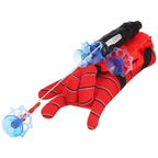 Young boy joyfully wears the Web Shooter Toy glove, ready for superhero play.