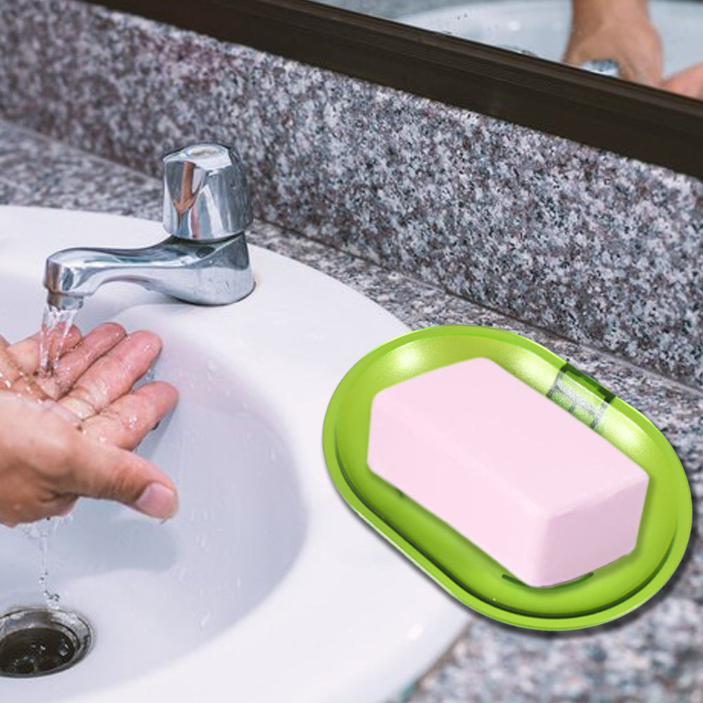 An empty wall-mounted plastic soap dish holder, ready for use.