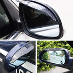 Car rearview mirror with rain protector installed, showing clear visibility.