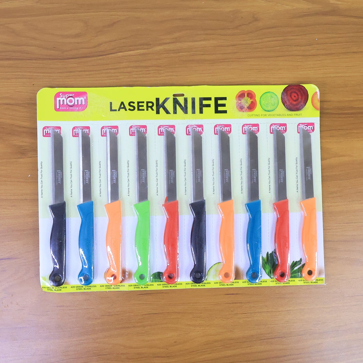Close-up of stainless steel kitchen knives in Supermom set