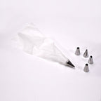 A collection of stainless steel piping nozzles for intricate cake and cupcake decorations.