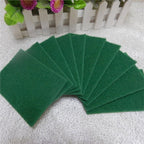 Set of 10 aqua green cleaning pads, ideal for tough stain removal.