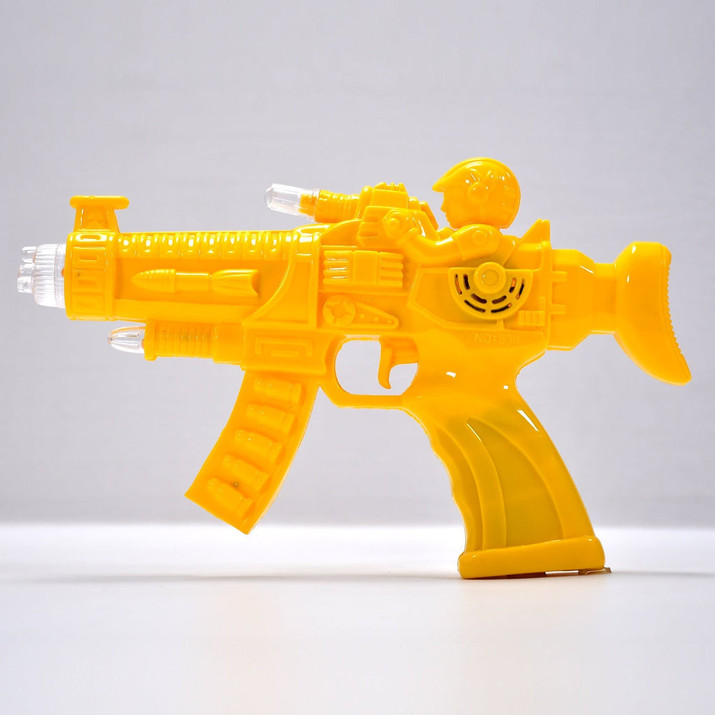 Top-down view of the transparent musical toy gun with glowing internal gears.