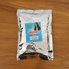 Brahmi herbal powder stored in a container for hair treatment