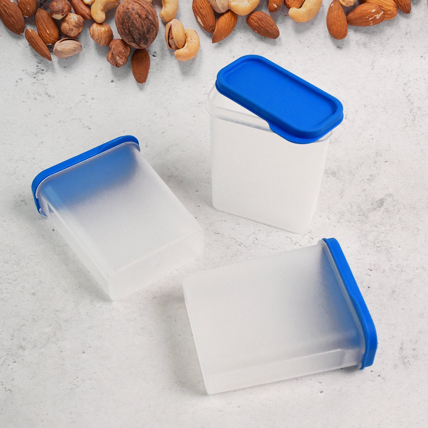 Close-up of Apex Glory containers snapping airtight blue lids securely