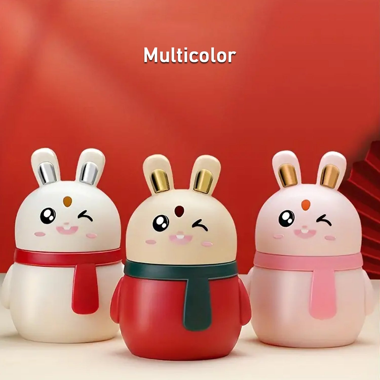 A collection of different colored rabbit toothpick dispensers, including red, green, and blue.