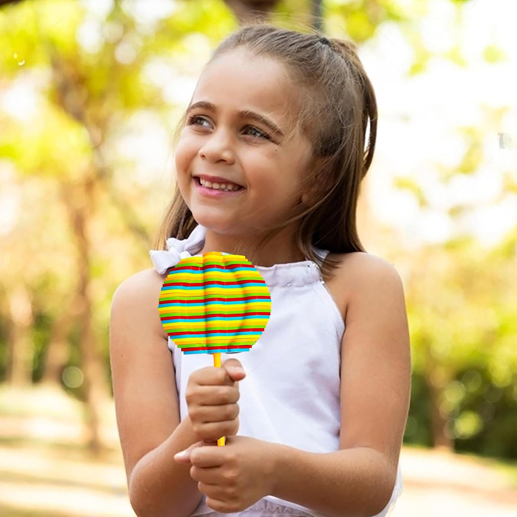 Sugar Petal variant of Spin Flower Candy rotating toy showing bright colors