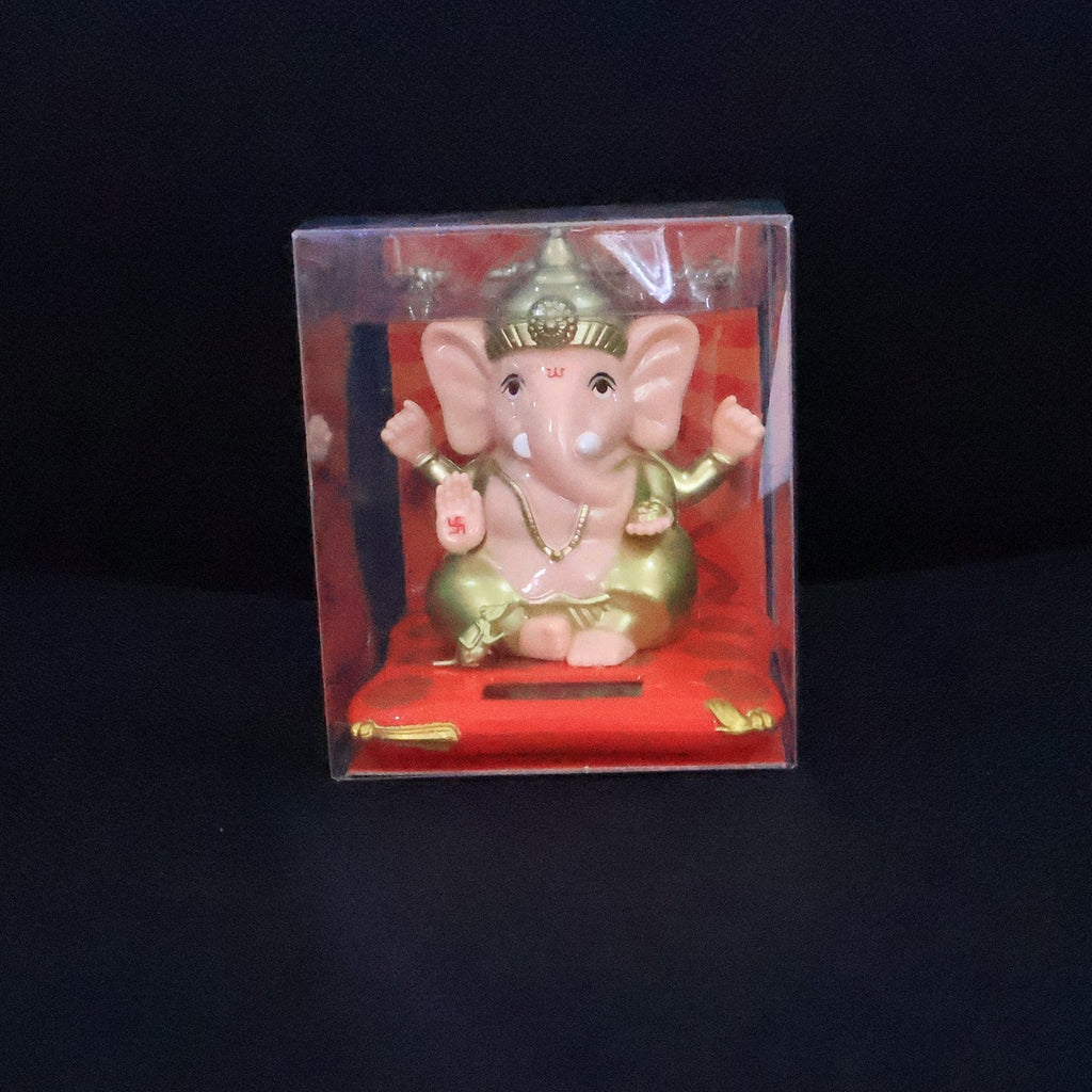 Medium Lord Ganesh Idol with softly glowing solar base amidst peaceful decor