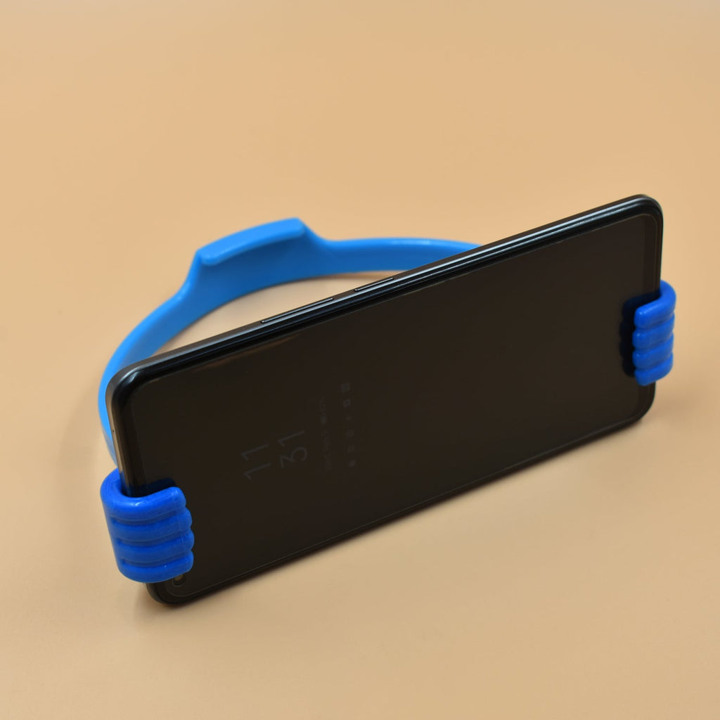 Hand shape mobile stand supporting a different smartphone model, showcasing versatility.
