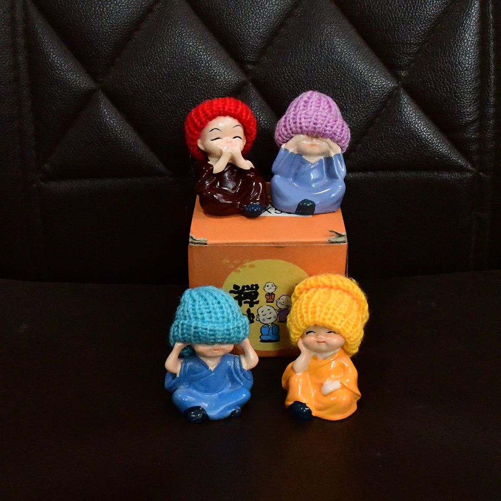 Resin monk Buddha set packaged in compact gift box ready for gifting or home decoration