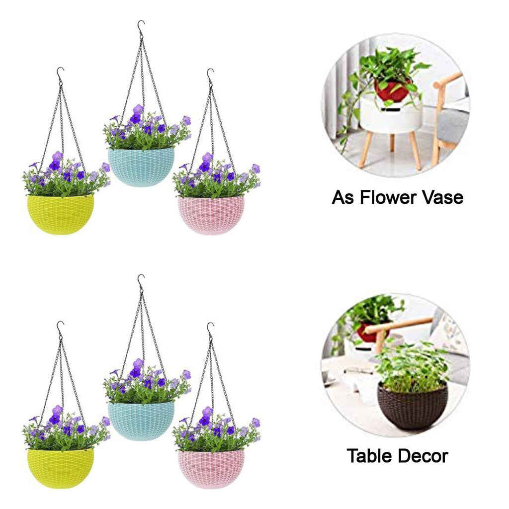 Hanging flower pots displayed outdoors on a fence, perfect for a garden decor combo.