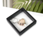 Nail clipper with unique floating keychain frame for easy portability