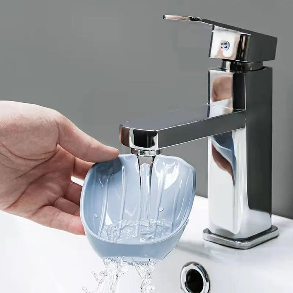 Self-draining soap dish installed in a modern shower area, promoting hygiene.