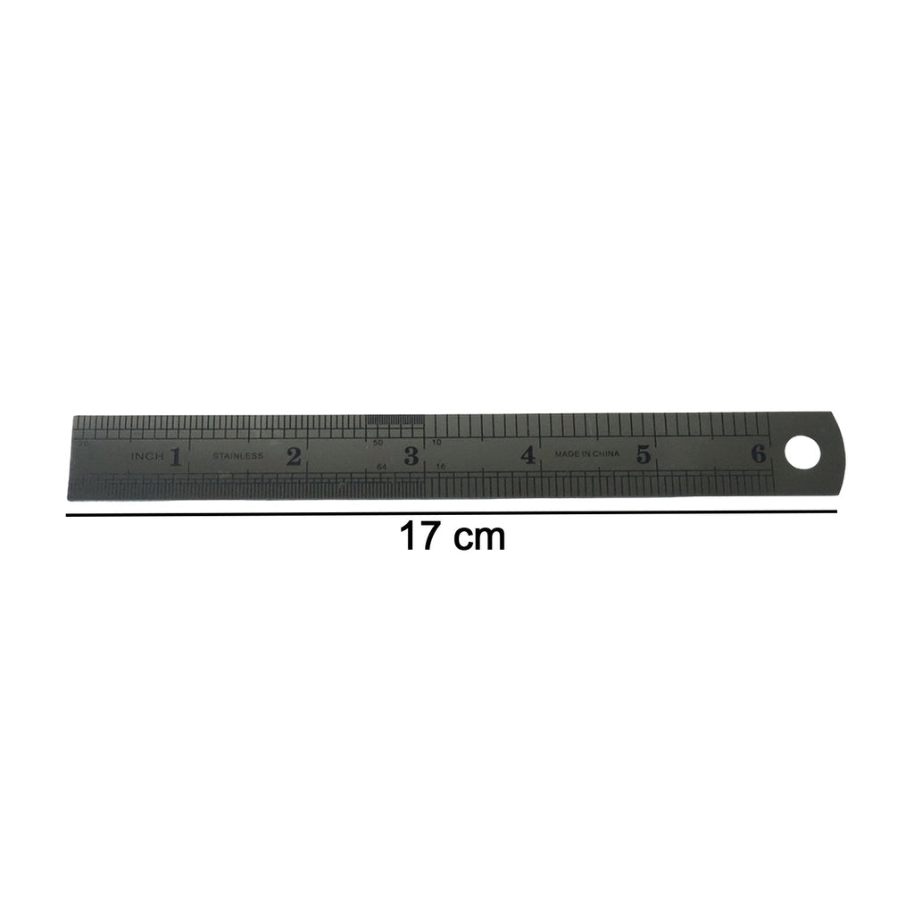 Close-up showing detailed markings on steel measuring ruler