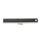 Close-up showing detailed markings on steel measuring ruler