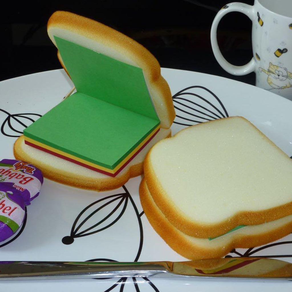 Creative display of sandwich sticky notes used as fun stationery items.
