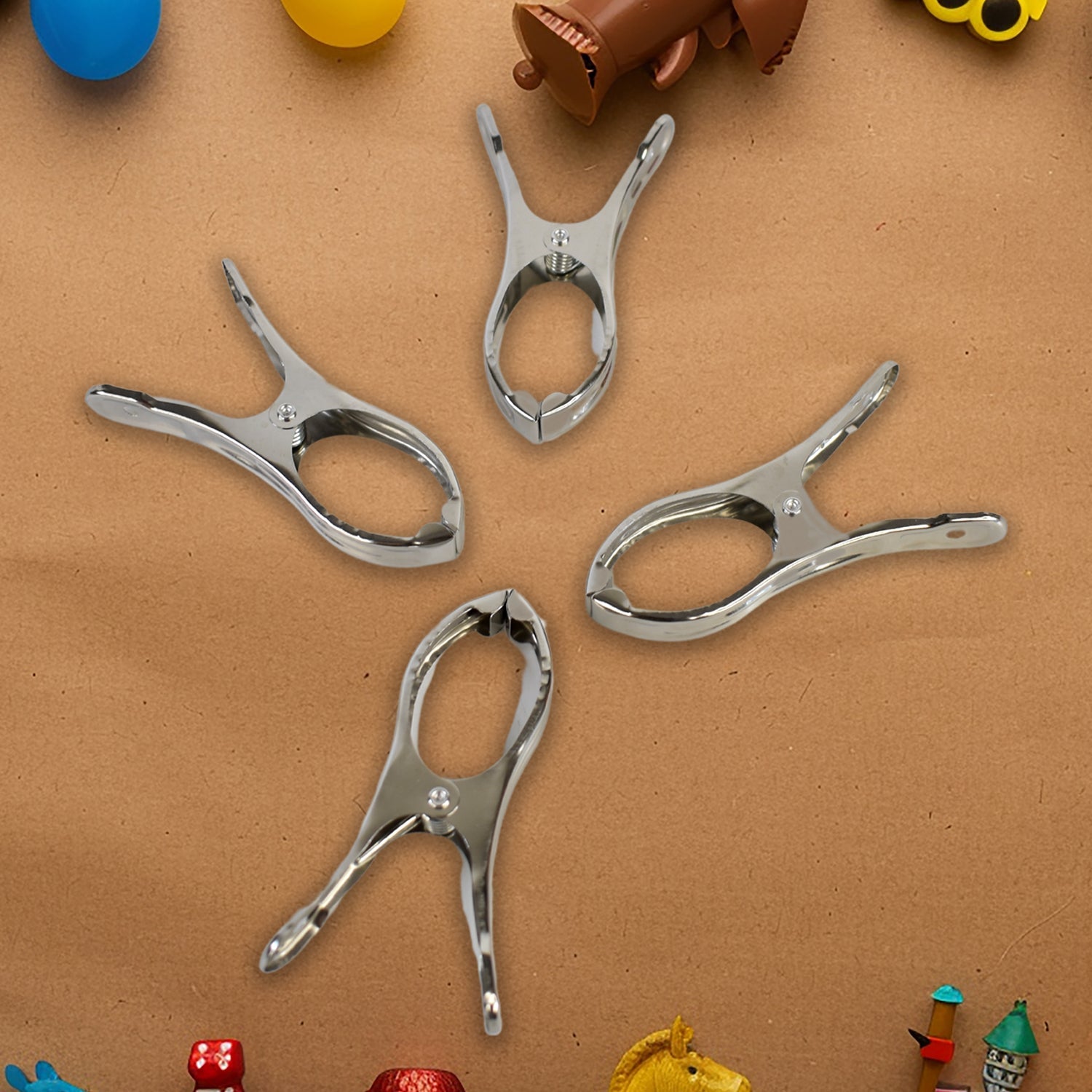 Durable stainless steel clothespins showcasing strong grip on towels.