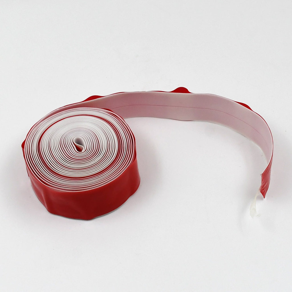 Kitchen wall sealing strip tape preventing moisture and dirt from accumulating.