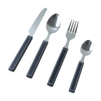 Tableware set featuring polished stainless steel cutlery with grip handles on tray