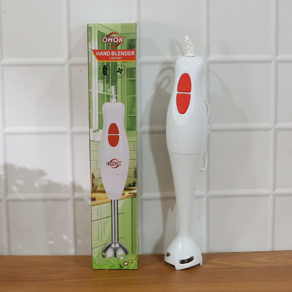 Electric hand blender stick placed on kitchen counter for use