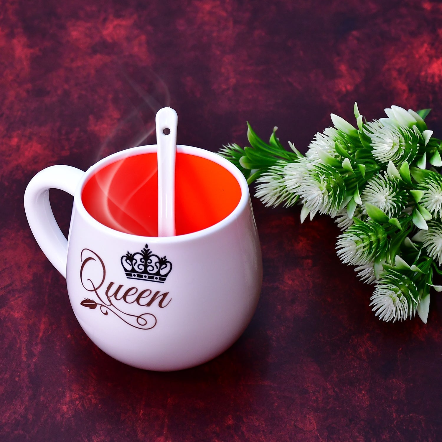 Chic plastic mug with spoon, packaged beautifully for any occasion.