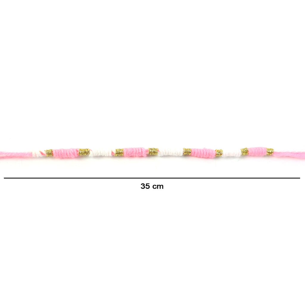 Pink & White Thread Rakhi on a hand