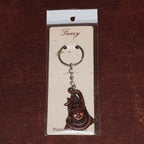 Hand holding Lord Shiva antique finish metal keychain