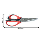 Kitchen scissors slicing fresh vegetables smoothly