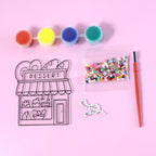 Kids painting craft activity set with colorful paint pots and beads