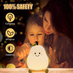 The rechargeable pear night lamp with its USB charging cable.